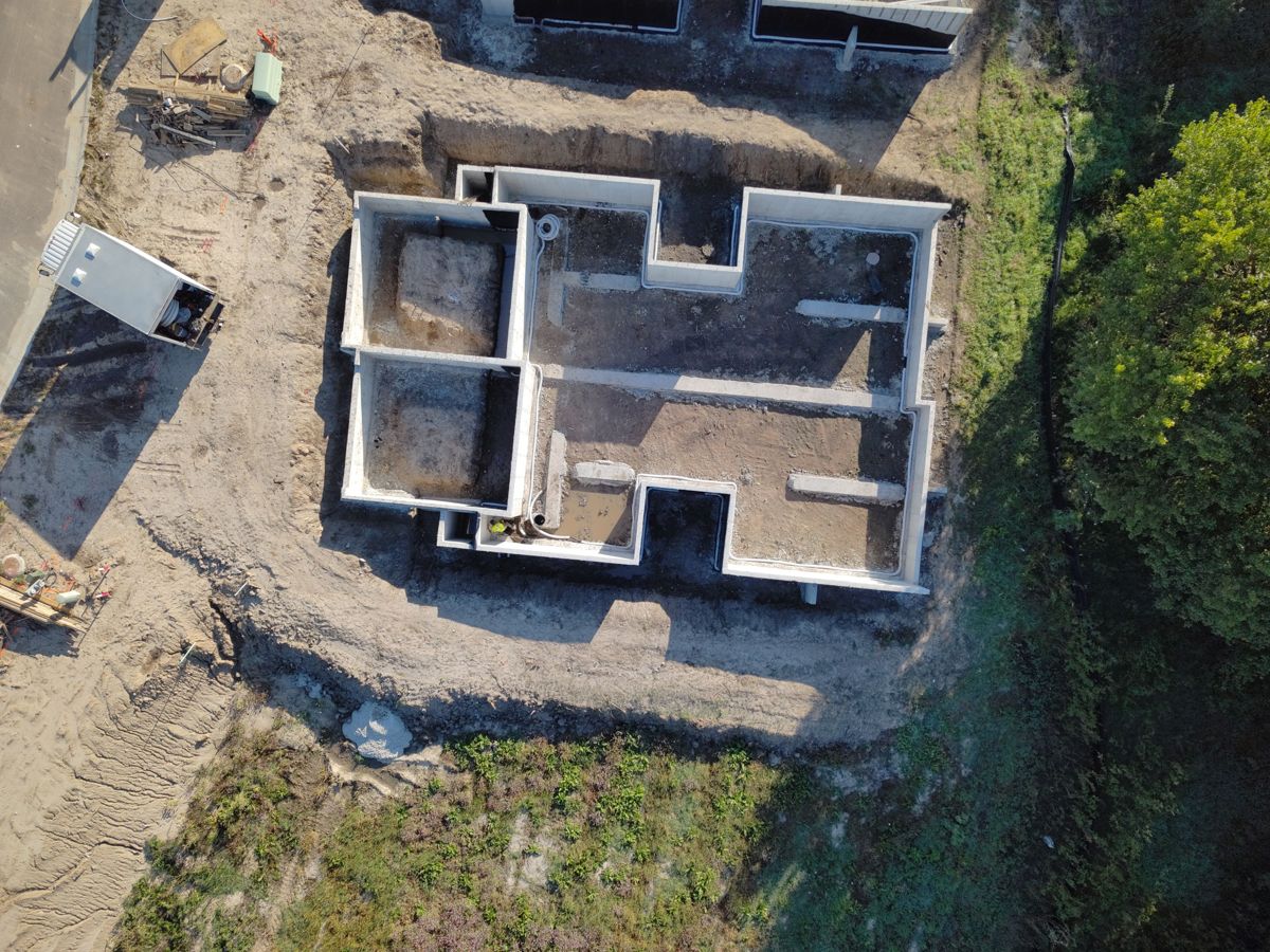 Close overhead view of a poured basement foundation